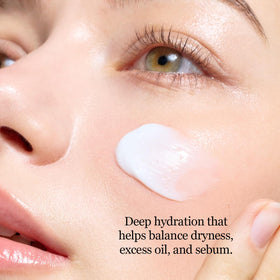 ROUND LAB cream being smoothed on hand for quick absorption benefit