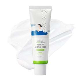 ROUND LAB front packaging showing SPF 50+ zinc oxide protection and compact tube benefit