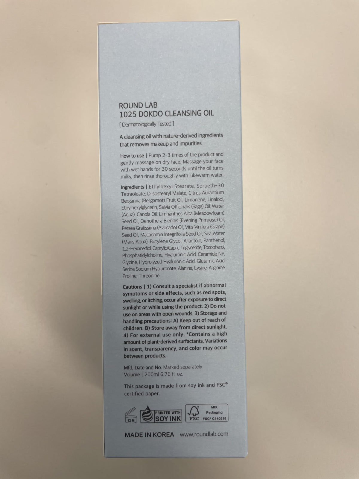 ROUND LAB packaging label detail close-up showing product information and brand authenticity