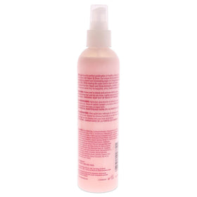 Roux texture pump dispensing golden serum, highlights lightweight argan oil shine