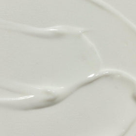 RŌZ milky serum texture swirled to show lightweight hydration effect