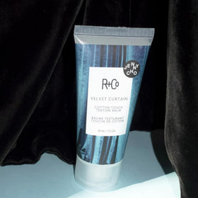 R+Co on a bathroom counter in lifestyle setting conveying everyday luxury