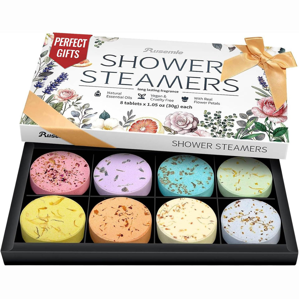 RUSEMLE luxury gift box open showing eight aroma steamers and satin bow