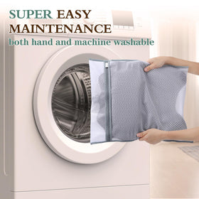 RUVINCE pillow next to folded towel showing compact size and scale