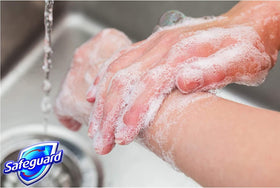 Hand lathering Safeguard soap demonstrating effective germ and dirt removal