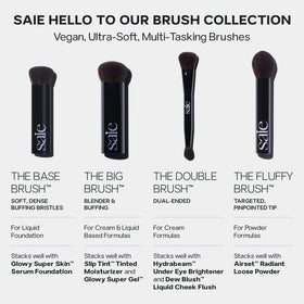 Saie brush held in hand to show scale and dense head for buildable coverage benefit