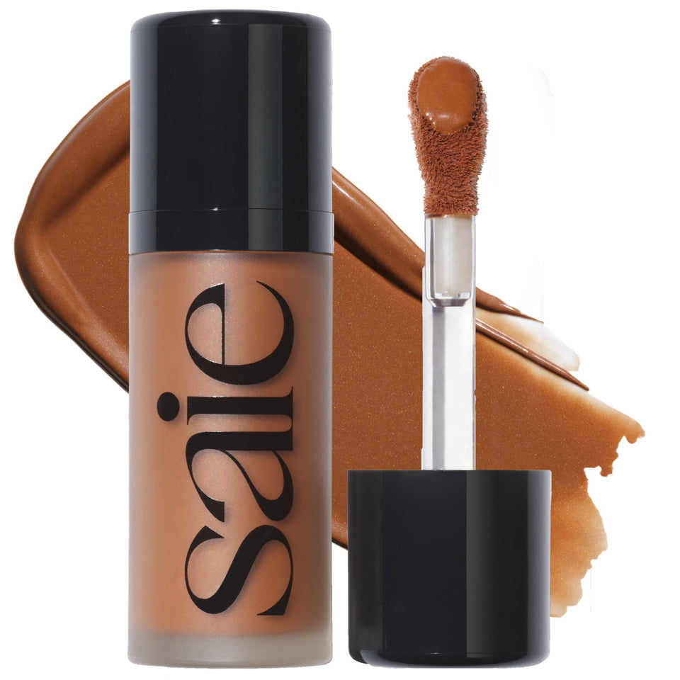 Saie Dew Bronze front packaging showing compact bronzer stick and label benefits