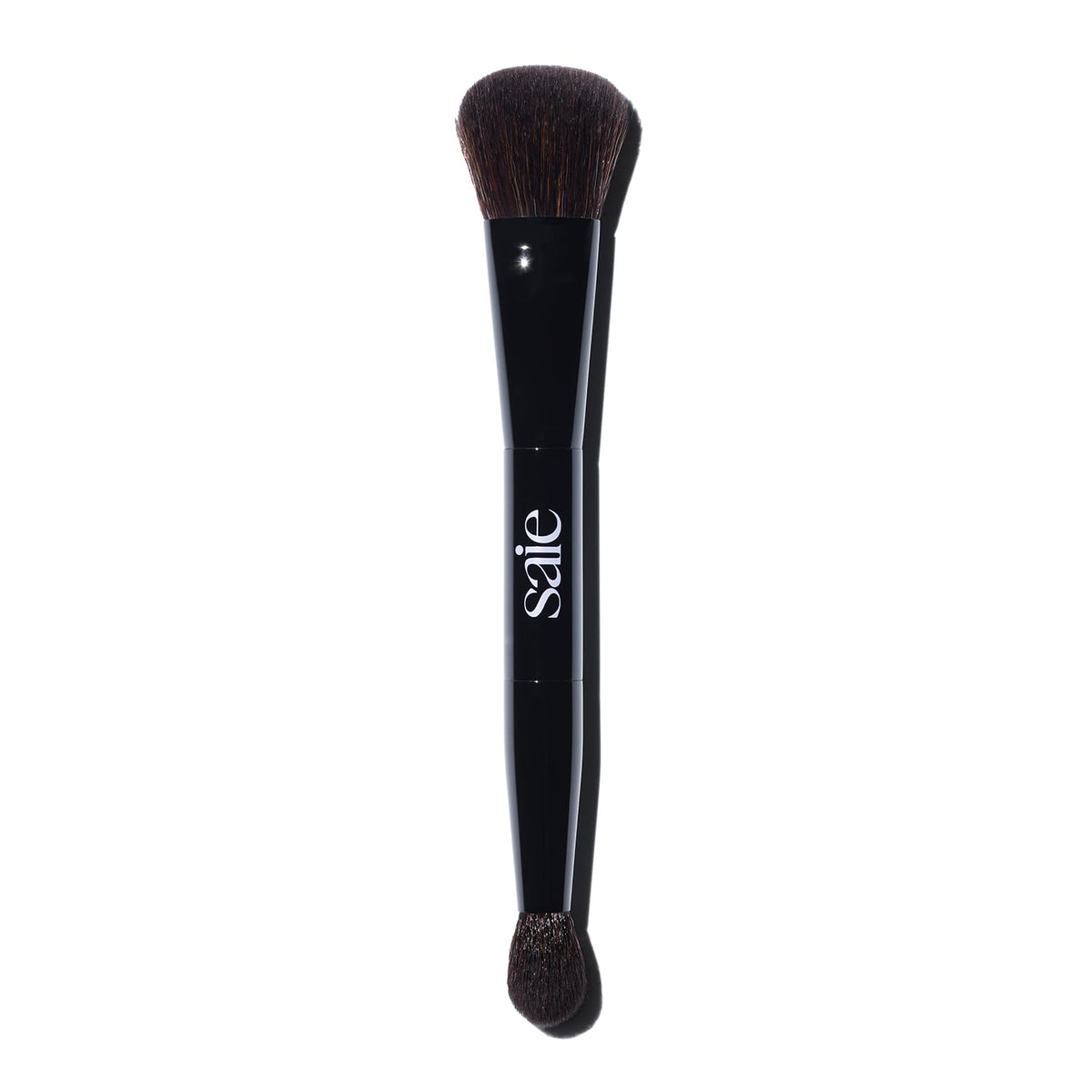 Saie double brush front view showing dual-ended design and versatility