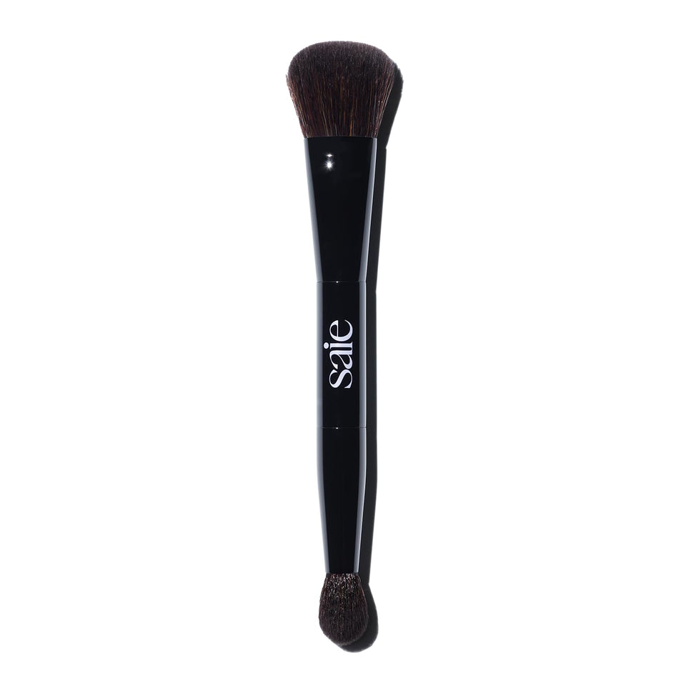 Saie double brush front view showing dual-ended design and versatility
