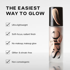 Saie mini glowy super gel warmglow swirled on skin showing subtle warm radiance