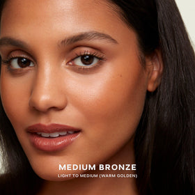 Saie Sun Melt swatch on skin showing medium bronze payoff and natural look benefit