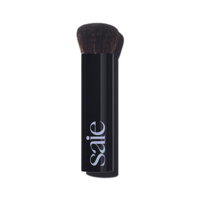 Saie brush front view showing shape and tapered head for smooth application