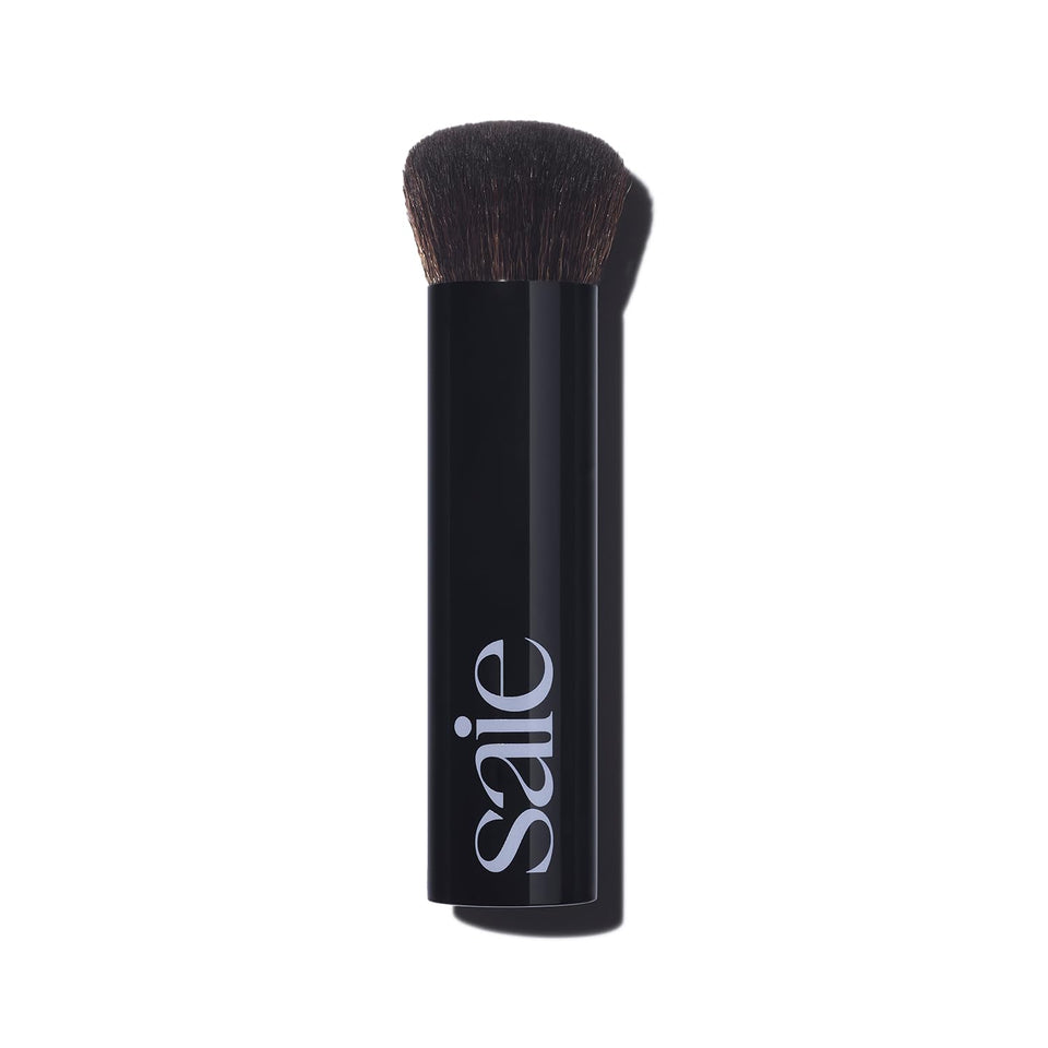Saie brush front view showing shape and tapered head for smooth application