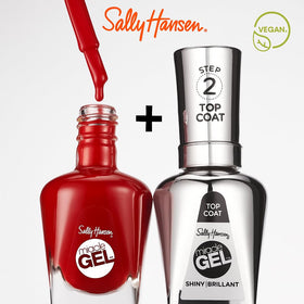 Sally Hansen manicure in use showing long-lasting red nails