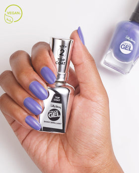 Sally Hansen glossy nails in use highlighting long-lasting high-shine benefit