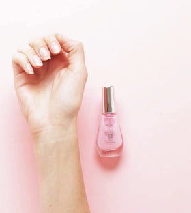 Sally Hansen applied on natural nails showing visible smoothing and protection