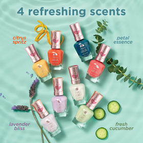 Sally Hansen bottle in hand for scale showing compact, travel-friendly size