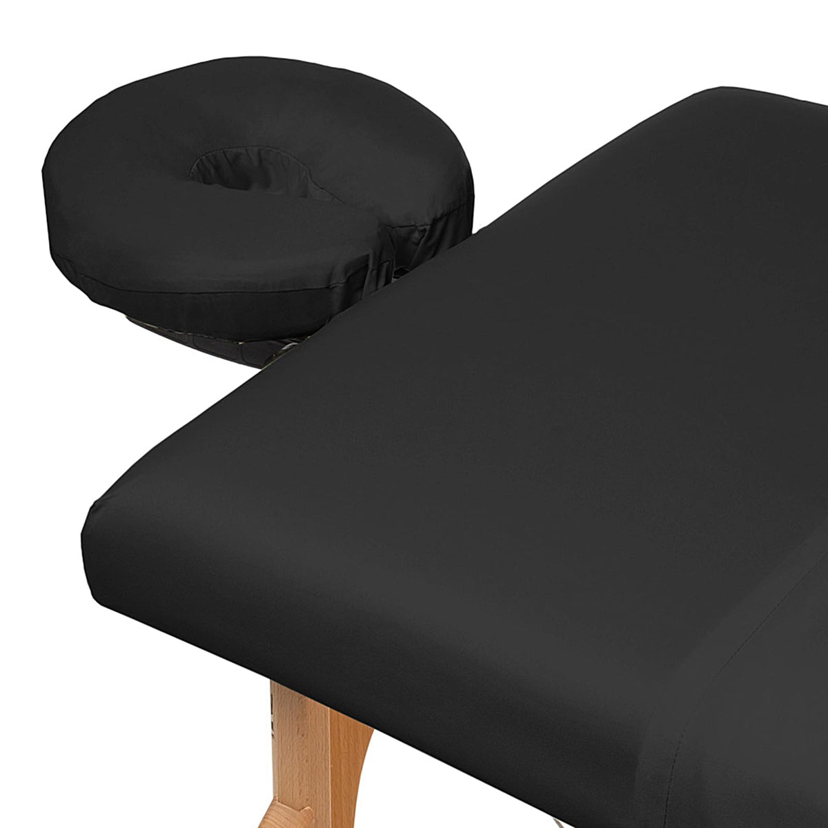 Saloniture flat sheet spread across massage table showing full coverage benefit