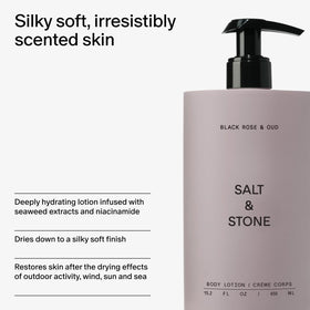 Salt & Stone bottle beside rose and oud wood conveying fragrance notes and sensory benefit