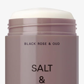 Salt & Stone on bathroom shelf in lifestyle scene showing premium grooming routine