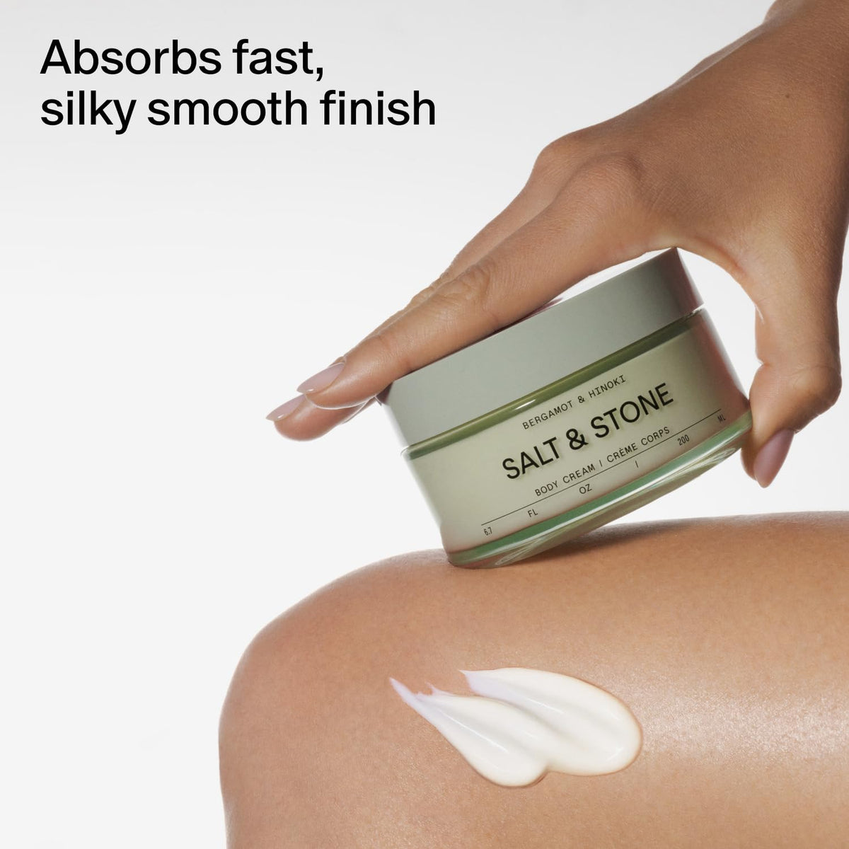 Salt & Stone label listing bergamot and hinoki scent notes for fresh woody aroma