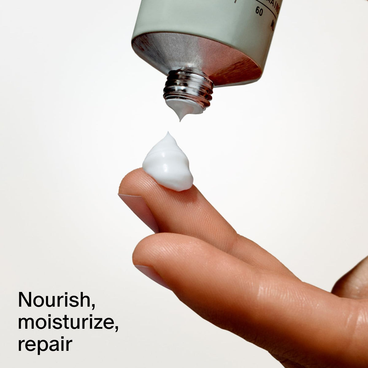Salt & Stone 2 fl oz tube in hand showing travel-ready hydration benefit