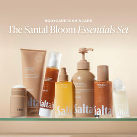 Saltair body oil being pressed into hands demonstrating smooth application and fast sinking