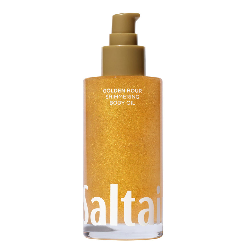 Saltair front bottle shot showing golden-hour shimmer and sleek packaging benefit: elegant display