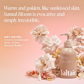 Hand holding a Saltair 17oz bottle to show scale and easy-grip pump convenience