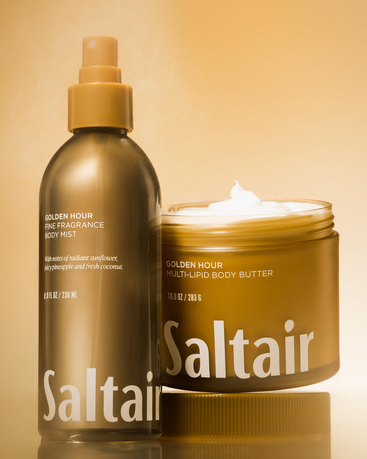 Saltair bottle held in hand for scale showing generous 8oz size and travel ease