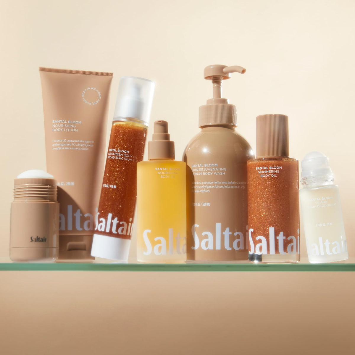 Saltair tubes beside a hand to show 10oz size for travel and home convenience