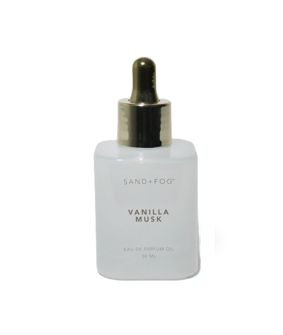 Sand + Fog dropper dispensing oil on wrist, precise application for long-lasting fragrance benefit