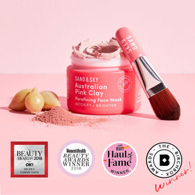 Sand & Sky open jar close-up showing creamy pink clay texture for smooth application