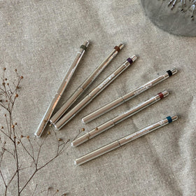 Sandstone Scandinavia pencil held in hand illustrating scale and easy application