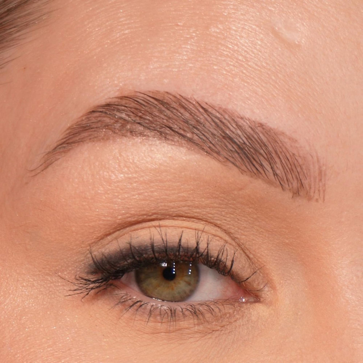 Sandstone Scandinavia pencil with cap off highlighting creamy tip for smooth application benefit