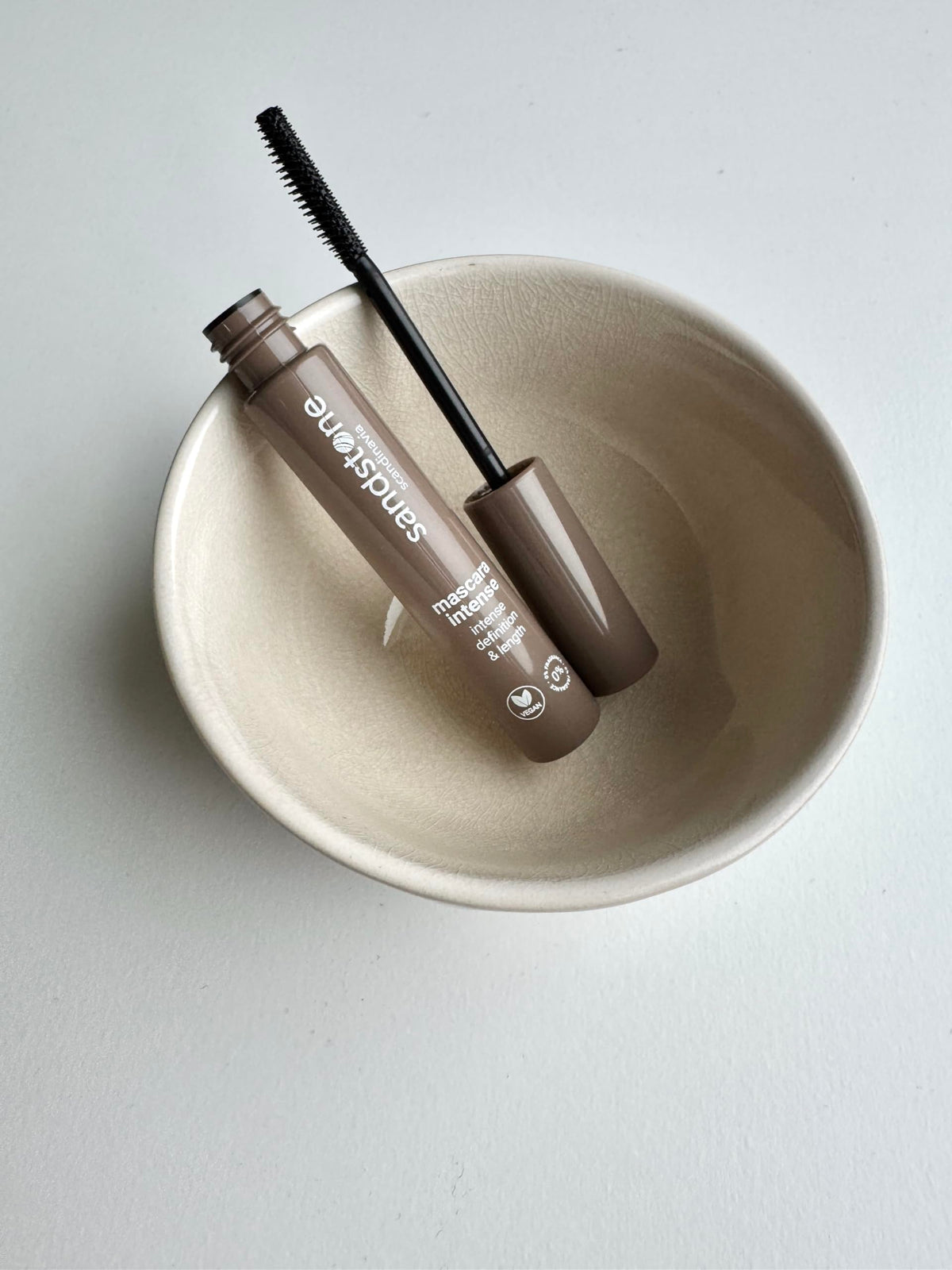 Sandstone Scandinavia mascara applied on model lashes showing natural lift and sensitive-eye comfort