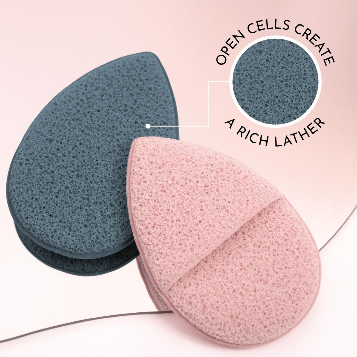 S&T INC. sponges held in hand showing compact 3.9x2.6 inch size and portability