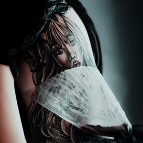 Saniderm bandages inside a tattoo care kit showing convenient portability