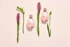 Sarah Jessica Parker Lovely fragrance pour closeup showing silky liquid and smooth finish