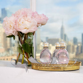 Sarah Jessica Parker Lovely side profile showing 1.7 oz volume and travel-friendly shape