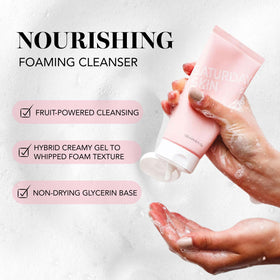 Saturday Skin dispenser squeezing foam into hand, shows easy daily application