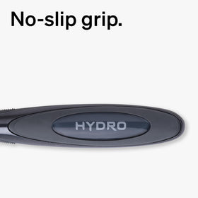 schick Hydro Sensitive held for size comparison showing compact, ergonomic design