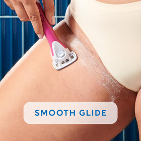 Schick Hydro Silk in-use trimming bikini area demonstrating precise shaping without pulling