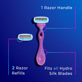 Schick Hydro Silk next-to-ruler scale showing compact size advantage