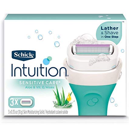 Schick Intuition blade refill in use on wet leg for smoother shave