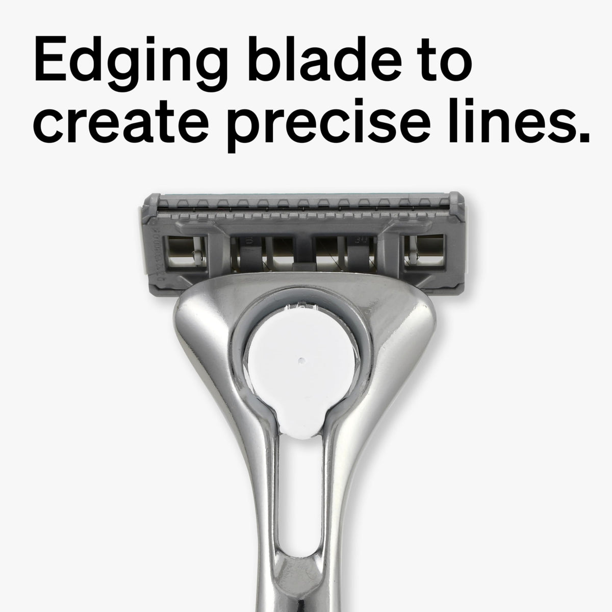 Schick Quattro lubricating strip close-up with vitamins for smoother glide