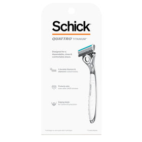 Schick Quattro package contents laid out: handle plus four cartridges