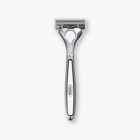 Schick Quattro ergonomic handle grip for improved control
