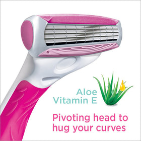 Schick Quattro Womens cartridge in use on leg showing contour-following comfort