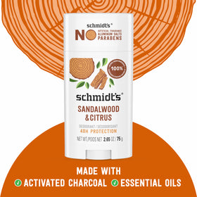 Schmidt's ingredients display of coconut, shea, jojoba oils for skin care